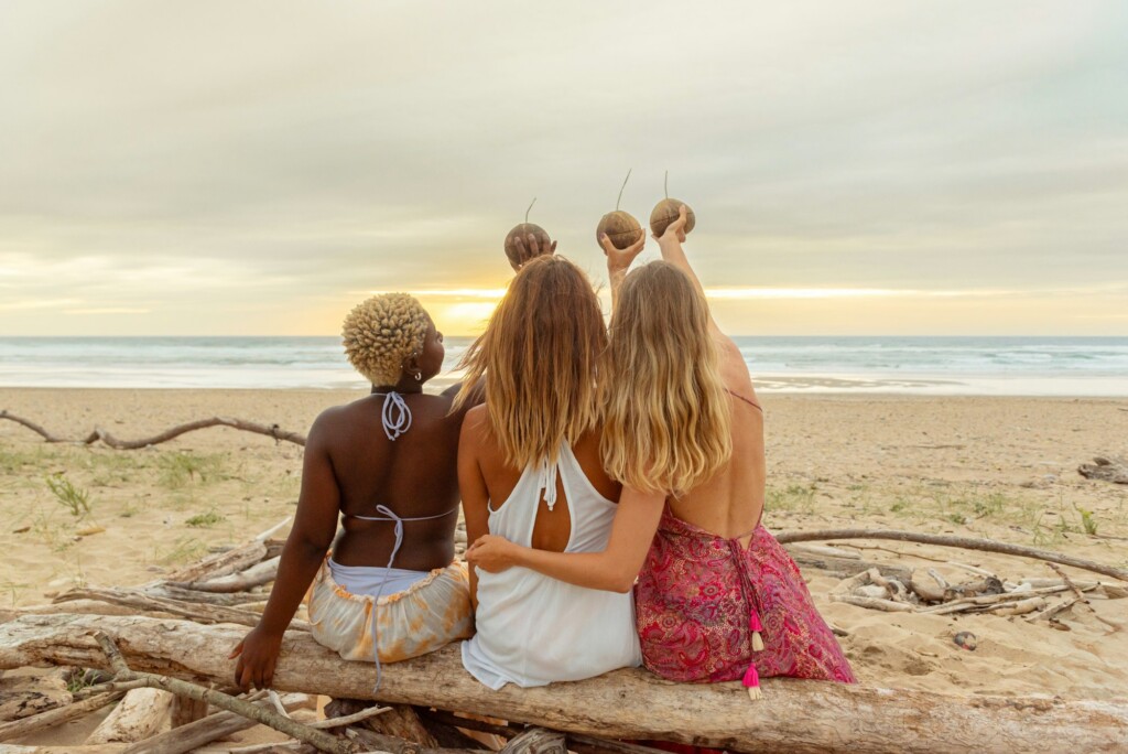 multiracial group of friends at a beach party